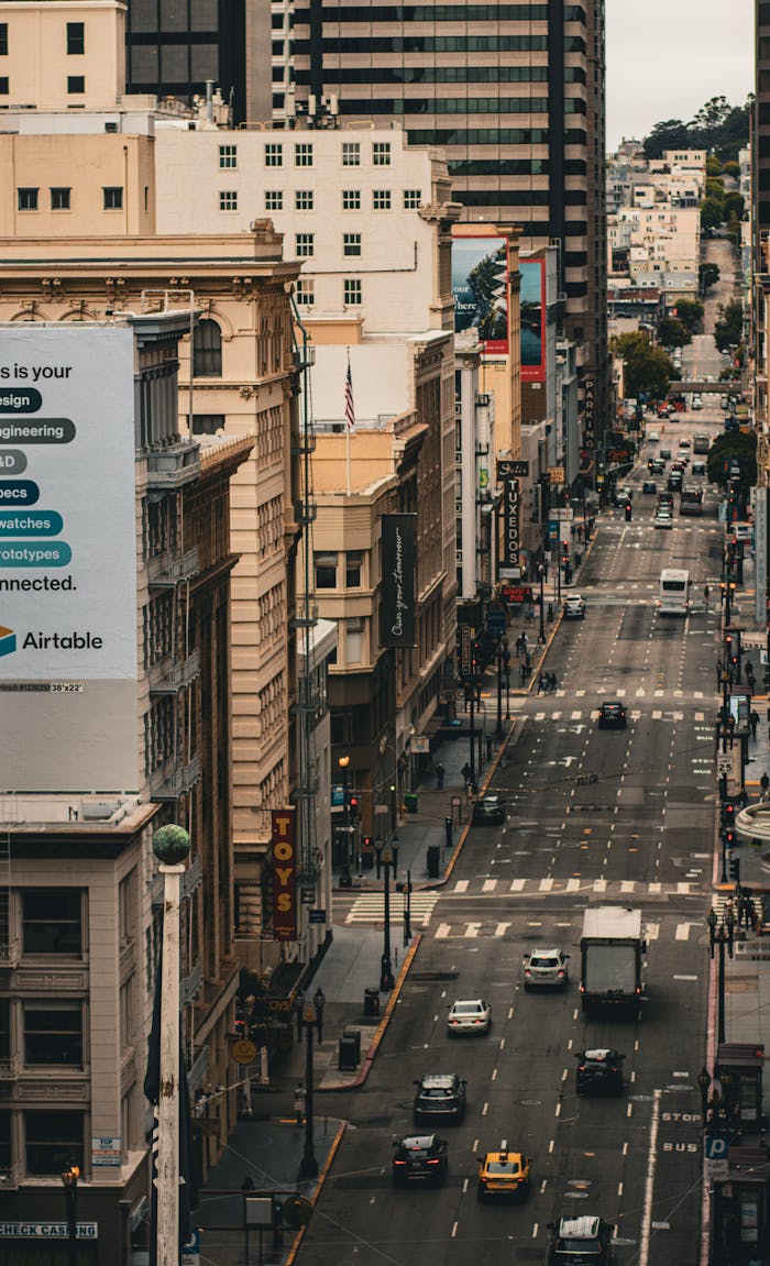 Aerial view of a busy street in San Francisco, showcasing urban life and architecture.